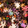 pile of wooden jigsaw puzzle pieces